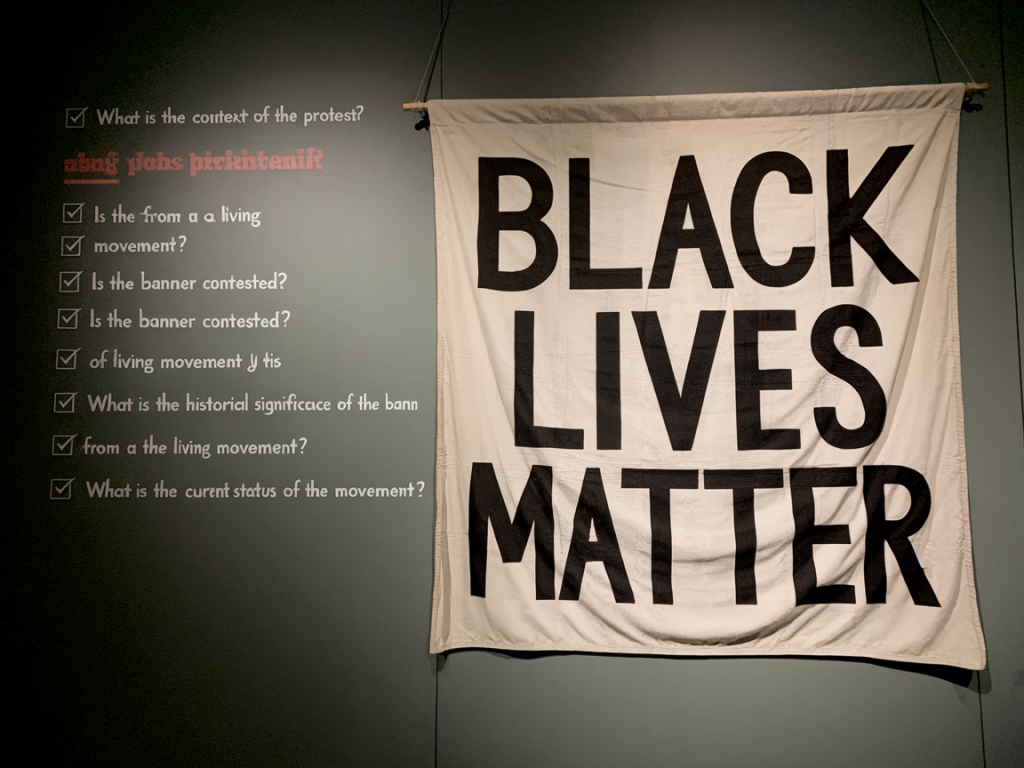 what ethical checklist should curators follow when displaying contested protest banners from living movements